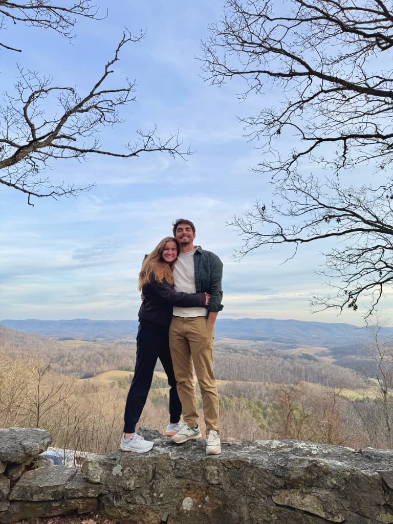 Luke and Bailey on a rocky overlook